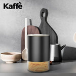 Load image into Gallery viewer, Kaffe Tea Canister Storage Container Black/Gold Round - 8 oz.

